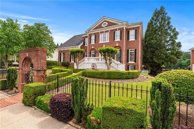 View of front of house featuring brick siding, fen