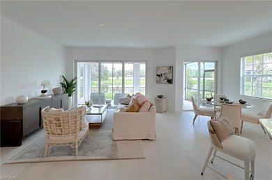 Living area featuring baseboards