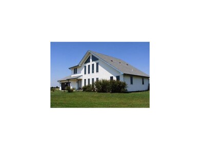 Custom built home on 40 acres near Clinton Lake!