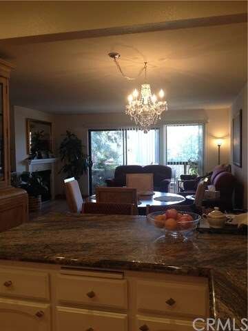 Dining area and breakfast bar open to living room 