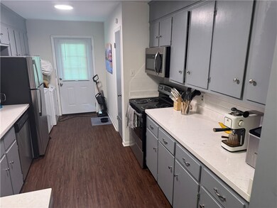Kitchen featuring appliances with stainless steel