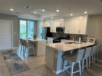 Kitchen with two eating areas