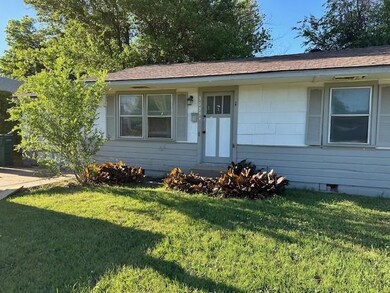 View of front facade with a front yard