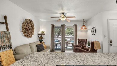 Living area with a ceiling fan