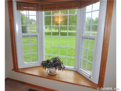 Other. Beautiful bay window with wood trim, overlo