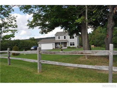 Exterior Front. Great front yard with mature trees