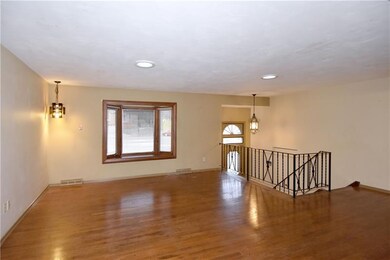 Natural light flows into this area from the large 