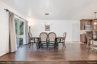 Spacious dining room connects the living room and kitchen in a natural flow.