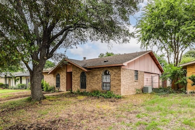 Ranch-style house with central air condition unit
