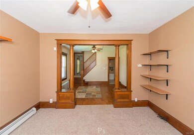 Living room space looking into dining room. Beauti