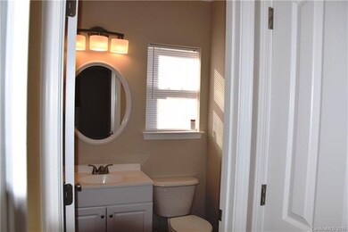 First floor powder room boasts new vanity, new mir