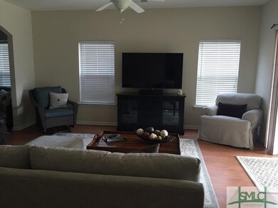 Updated photo of living room. Neutral paint.