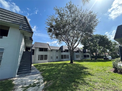 8400 W Sample Rd unit 102, Coral Springs, FL 33065 - photo 2