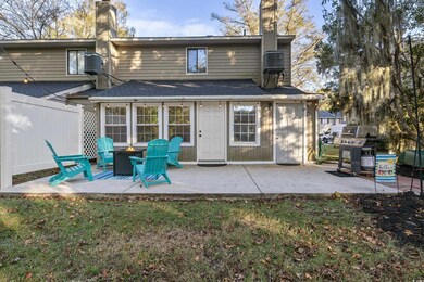 Back of house with a patio