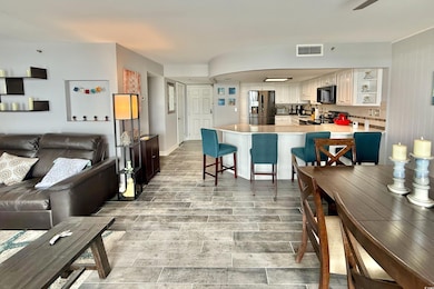 Living area featuring light wood-type flooring
