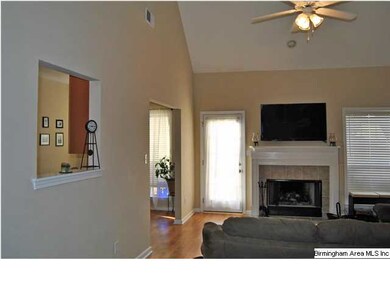 Vaulted ceilings and a convenient pass through win
