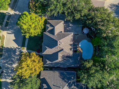 View of subject property featuring a pool
