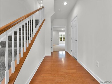 Entrance Foyer with Large Coat Closet and Door to
