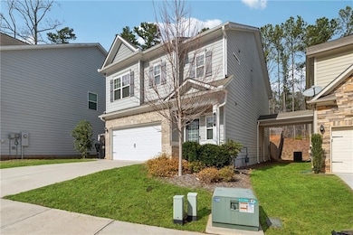View of front of house with concrete driveway, a f