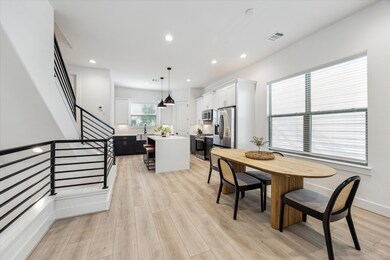 Open layout blends kitchen and dining seamlessly.