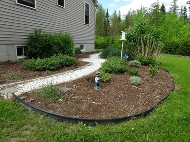 Both front and back yards have...