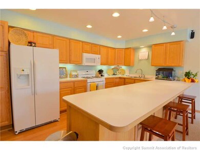 Kitchen. Tons of cabinet and counter space in the