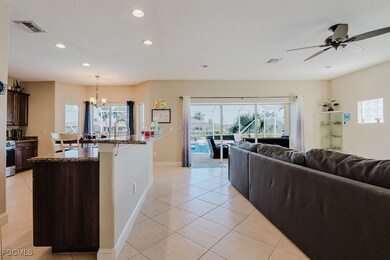 Kitchen w/ open floor plan to living room