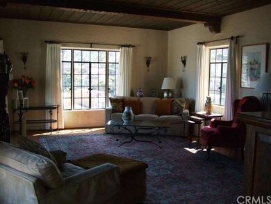 Living Room with Beamed Ceiling