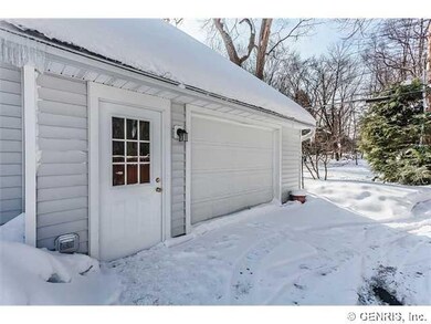 Garage. A two car garage with a 1.5 car door.  Cou