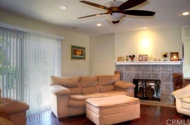 Living Room - Inviting fireplace also opens on the