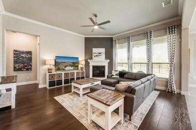 Spacious family room with accent wall and corner f