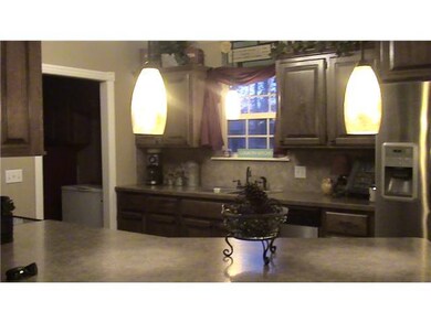 Kitchen. Kitchen opens up to Living room and Dinin