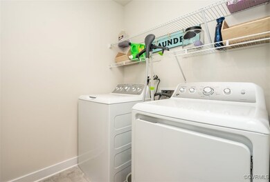 Washroom featuring washer and clothes dryer, laund
