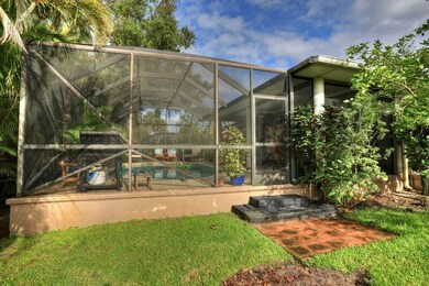 Back view of screened lanai/pool area