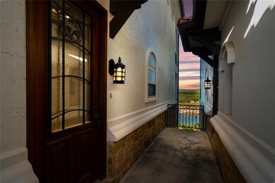 Exterior entry at dusk with crawl space