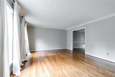 Formal living room - HUGE!  Hardwood floors and cr