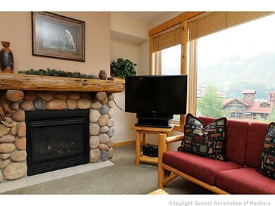 Living Room. River-rocked gas fireplace (included