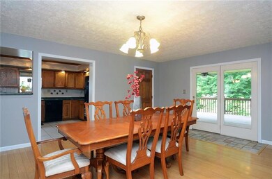 Large dining area with Glass double doors! What a 