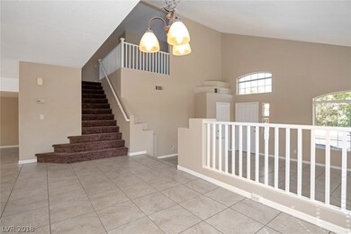 Formal dining room with view of upstairs