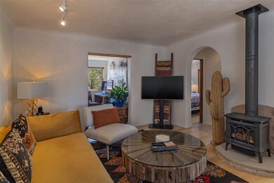 Living Room accesses both Office and Bedroom Suite