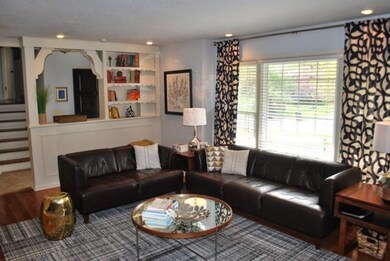 Large great room off front entry with custom built
