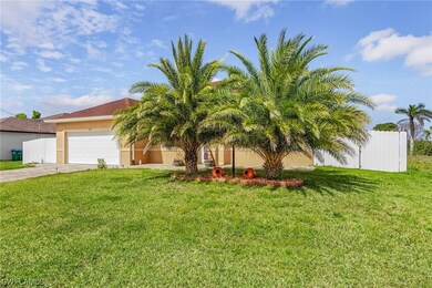 Mature Canary Island Date Palms in front yard