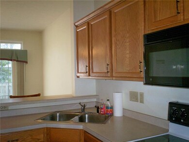 KITCHEN OPENS INTO GREAT ROOM AND PRIVATE PATIO