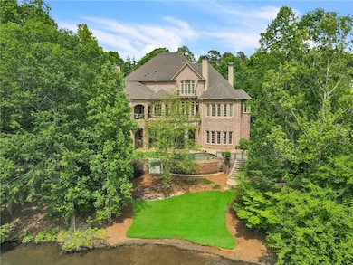 Rear view of property featuring a water view