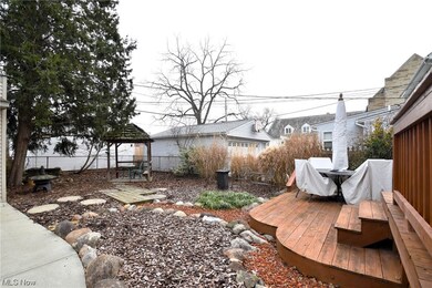 View of yard with a gazebo and a wooden deck