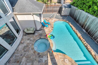 Fabulous backyard oasis featuring a sparkling pool