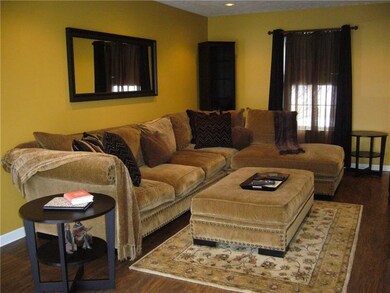 First floor family room with new flooring and plen