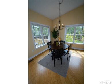 Breakfast Area looking out on to deck, open to Fam