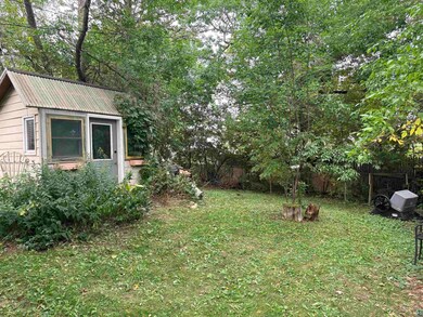 View of yard with an outbuilding