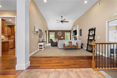 A view from the tiled entryway looking into the la